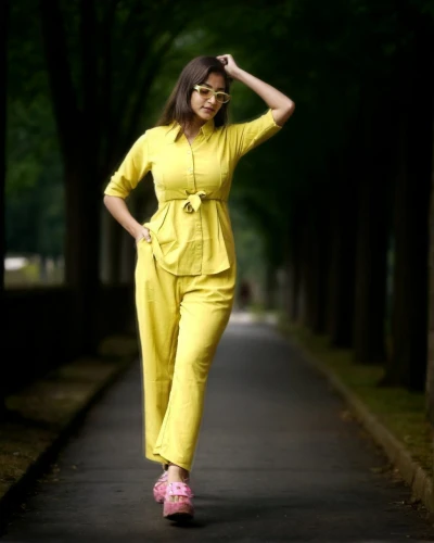 yellow jumpsuit,ao dai,jumpsuit,yellow,yellow color,japanese woman,women fashion,vietnamese woman,asian woman,women clothes,woman walking,sprint woman,yellow and black,yellow background,yellow bell,plus-size model,girl in a long dress,acridine yellow,yellow mustard,oriental girl