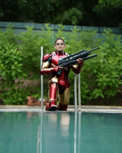 dead pool,actionfigure,divemaster,aquanaut,buoyancy compensator,pool cleaning,action hero,human torpedo,water gun,action figure,lifeguard,jumping into the pool,swimming machine,paddler,dry suit,dug-out pool,vax figure,water sport,life saving swimming tube,toy photos