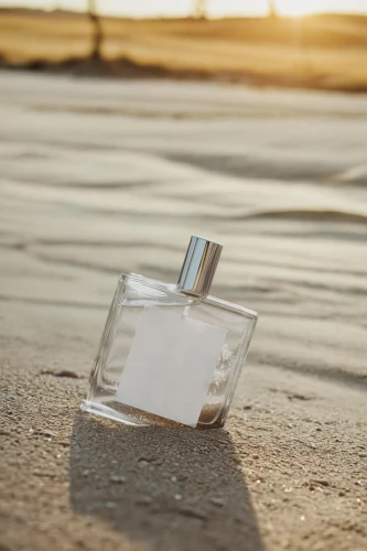 perfume bottle,coconut perfume,fragrance,parfum,aftershave,natural perfume,perfumes,creating perfume,perfume bottles,scent of jasmine,smelling,perfume bottle silhouette,scent,orange scent,fragrance teapot,bottle surface,home fragrance,the smell of,cologne water,isolated product image