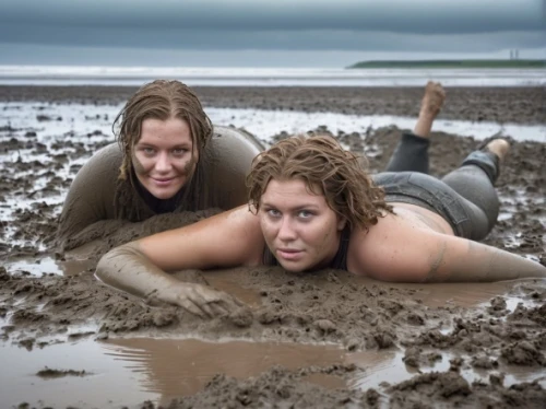 mud wrestling,obstacle race,mudflat,head stuck in the sand,mud,playing in the sand,mudskippers,mud wall,muddy,the sandpiper combative,the people in the sea,stranding,mud village,buried,molehills,marine scientists,sandpit,burpee,endurance sports,folk wrestling