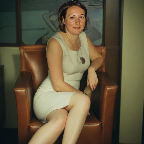 sitting on a chair,woman sitting,1950s,retro woman,1960's,13 august 1961,in seated position,club chair,retro women,rosa khutor,model years 1960-63,art deco woman,vintage female portrait,1940s,armchair,rhonda rauzi,1967,1965,1971,portrait of christi