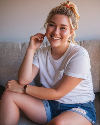 plus-size model,a girl's smile,smiley girl,sitting on a chair,girl in t-shirt,in a shirt,beautiful young woman,smiling,teen,greta oto,girl on a white background,tori,jean shorts,adorable,a smile,on the couch,blonde on the chair,cute,legs crossed,pretty young woman,Conceptual Art,Daily,Daily 25