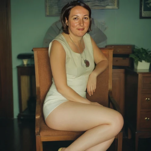 woman sitting,woman's legs,vintage female portrait,sitting on a chair,1950s,female model,model years 1960-63,in pantyhose,sauna,retro woman,retro women,1940s,greta oto,vintage woman,woman portrait,in seated position,1950's,women's legs,1960's,girl sitting