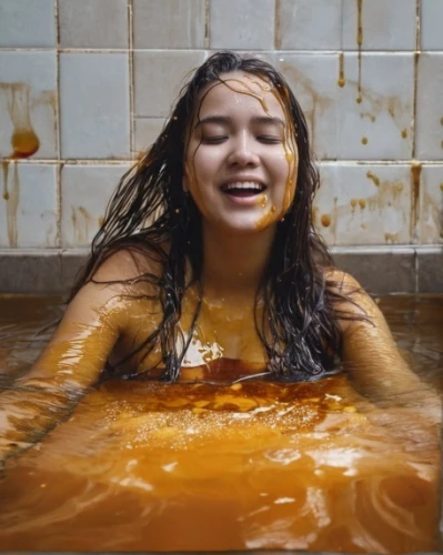 wet,the girl in the bathtub,caramel,bathtub,water bath,bath,bath oil,taking a bath,wet girl,bath with milk,orangina,tub,caramel color,milk splash,milk bath,dulce de leche,to bathe,orange,bathing,bathing fun