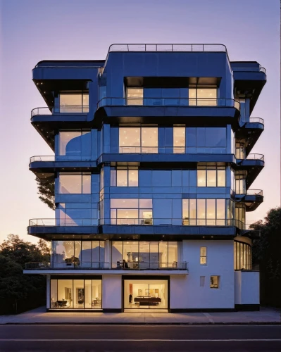 glass facade,appartment building,modern architecture,residential tower,cubic house,residential building,modern building,ludwig erhard haus,facade panels,kirrarchitecture,apartment building,multi-storey,bulding,apartment block,contemporary,cube house,aqua studio,multistoreyed,apartments,glass building