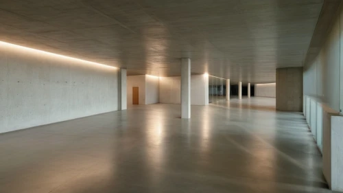 concrete ceiling,hallway space,daylighting,exposed concrete,structural plaster,recessed,archidaily,hallway,corridor,empty interior,empty hall,contemporary,arq,basement,concrete slabs,lecture hall,ceiling lighting,large space,hall,interior modern design,Photography,General,Realistic