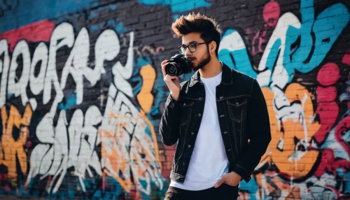 man talking on the phone,nikon📸,taking photos,photographer,taking photo,nikon,brick wall background,the blonde photographer,camera photographer,on the phone,paparazzi,dslr,graffiti,camera,pompadour,brick background,paparazzo,photographing,hipster,taking picture,Illustration,Black and White,Black and White 33