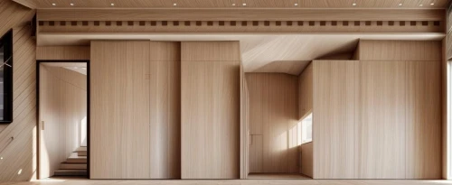 room divider,timber house,doric columns,wooden construction,storage cabinet,archidaily,bookshelves,wooden sauna,armoire,cabinetry,walk-in closet,woodwork,plywood,bookcase,wooden facade,columns,cupboard,mouldings,wood structure,dark cabinetry