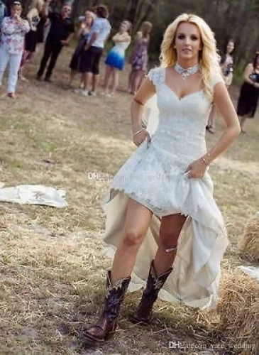 trisha yearwood,blonde in wedding dress,wedding dress train,walking down the aisle,bridal party dress,wedding photography,wedding photographer,dead bride,wedding dress,mother of the bride,wedding photo,southern belle,wedding dresses,country dress,social,to marry,bride,wedding gown,ballerina in the woods,bridal dress