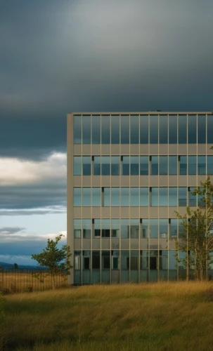 glass facade,kettunen center,citadel hill,glass building,company headquarters,office building,structural glass,corporate headquarters,company building,duluth,discovery park,office buildings,montana post building,abandoned building,glass facades,modern building,aurora building,commercial building,dunes house,industrial building,Photography,General,Realistic