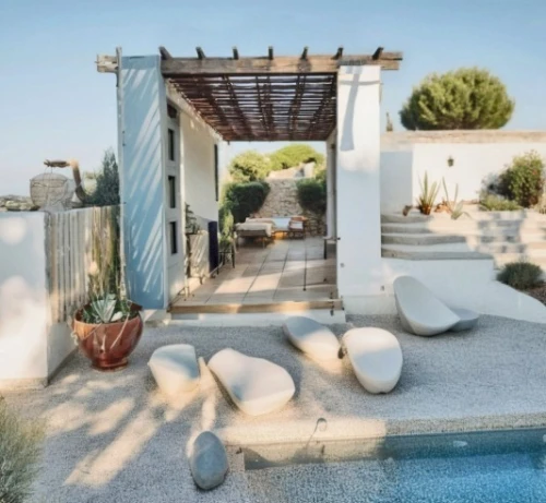 outdoor furniture,outdoor sofa,mykonos,holiday villa,puglia,patio furniture,dunes house,beach furniture,the balearics,cabana,roof terrace,outdoor table and chairs,garden furniture,dug-out pool,sunlounger,stucco wall,folegandros,greece,pool house,provencal life