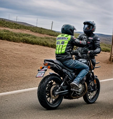 a motorcycle police officer,motorcycling,motorcycle tours,supermoto,motorcycle drag racing,sani pass,desert racing,ride out,mv agusta,motorcycle racer,wheelie,motorcycle racing,two-wheels,r1200,motorcycle tour,two wheels,motor-bike,riding instructor,road racing,isle of man tt