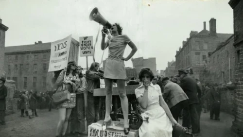 wheelstand competition,girl holding a sign,suffragette,demonstration,13 august 1961,may day,shrovetide,protesters,protestor,girl in a historic way,on the poles,protest,farmer protest,maypole,1965,belfast,lovat lane,1967,1952,eisteddfod