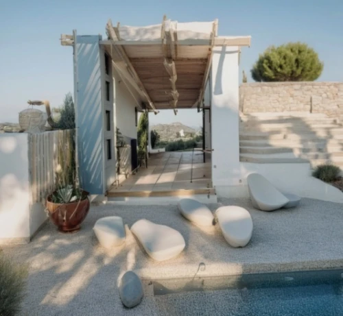 mykonos,dunes house,outdoor furniture,puglia,outdoor sofa,holiday villa,folegandros,the balearics,lakonos,roof terrace,greece,beach furniture,exposed concrete,exterior decoration,holiday home,patio furniture,pool house,cubic house,luxury property,summer house