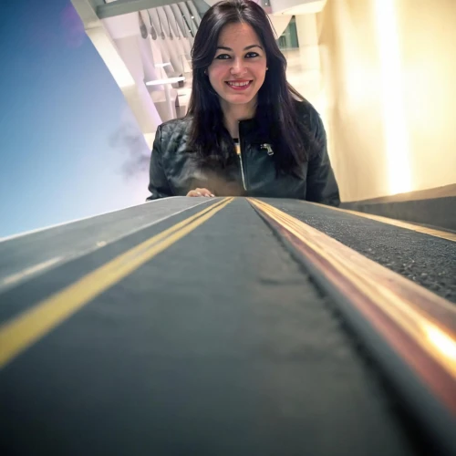 moving walkway,social,overpass,metro escalator,the girl at the station,skytrain,jet bridge,escalator,yellow line,ramp,skyway,hollywood metro station,highline,dulles,tarmac,rail way,sky train,rail track,streetluge,train platform