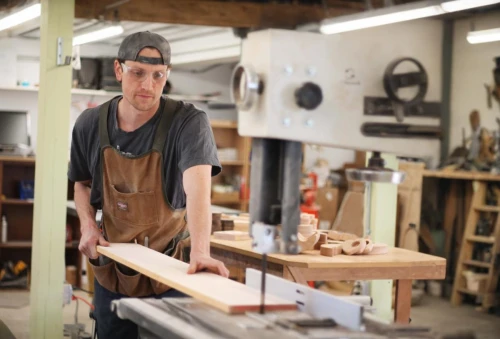 woodworker,a carpenter,carpenter,woodworking,craftsman,woodwork,radial arm saw,sculptor ed elliott,craftsmen,metalsmith,sawhorse,crosscut saw,blue-collar worker,jointer,wood shaper,resaw,hand saw,framing hammer,bandsaw,wooden frame construction