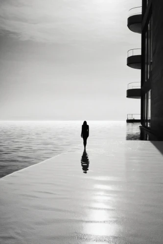 man at the sea,blackandwhitephotography,walk on water,girl walking away,spaciousness,woman walking,loneliness,andreas cross,solitary,monochrome photography,solitude,the endless sea,the shallow sea,conceptual photography,silhouette of man,to be alone,james handley,exploration of the sea,woman silhouette,the horizon,Illustration,Black and White,Black and White 33