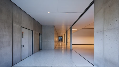 concrete ceiling,hallway space,exposed concrete,concrete slabs,hallway,corridor,concrete wall,structural plaster,reinforced concrete,concrete construction,daylighting,recessed,sliding door,archidaily,concrete,modern architecture,modern office,arq,glass wall,contemporary,Photography,General,Realistic
