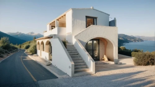 dunes house,cubic house,house in mountains,house in the mountains,stucco frame,inverted cottage,private house,stucco wall,house shape,luxury property,frame house,holiday villa,exterior decoration,architectural style,stone house,residential house,beautiful home,roof landscape,exposed concrete,holiday home