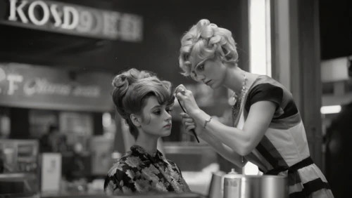 hairdresser,soda shop,cigarette girl,hairstylist,retro diner,updo,soda fountain,cosmetics counter,applying make-up,hair care,blue jasmine,shopwindow,50's style,women's cosmetics,doll looking in mirror,mannequins,girl kiss,hair dresser,waitress,beauty salon