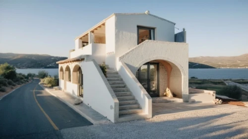 dunes house,cubic house,inverted cottage,amorgos,stone house,holiday villa,private house,stucco frame,modern architecture,architectural style,house by the water,holiday home,frame house,house shape,lycian way,karpathos,folegandros,exposed concrete,exterior decoration,residential house