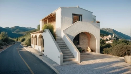 dunes house,cubic house,karpathos,stone house,house in mountains,house in the mountains,holiday villa,architectural style,amorgos,roof landscape,private house,iranian architecture,stucco wall,tiled roof,house shape,residential house,frame house,clay house,exterior decoration,stucco frame