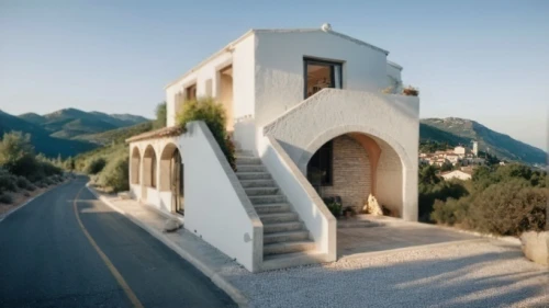 dunes house,cubic house,karpathos,amorgos,stone house,house in mountains,house in the mountains,holiday villa,private house,architectural style,stucco wall,roof landscape,iranian architecture,clay house,residential house,frame house,tiled roof,house shape,karpathos island,stucco frame