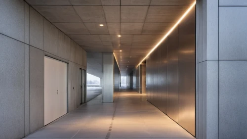 hallway space,hallway,corridor,concrete ceiling,walkway,daylighting,entry path,recessed,exposed concrete,security lighting,metal cladding,elevators,structural plaster,glass facade,office buildings,passage,archidaily,concrete slabs,the threshold of the house,underpass,Photography,General,Realistic