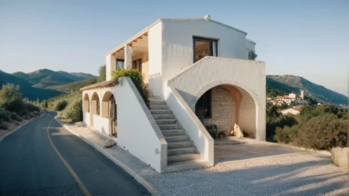 dunes house,cubic house,house in mountains,house in the mountains,holiday villa,private house,roof landscape,stucco wall,stone house,architectural style,karpathos,residential house,exterior decoration,stucco frame,house shape,beautiful home,traditional house,folding roof,luxury property,small house