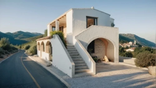 dunes house,cubic house,house in mountains,holiday villa,house in the mountains,private house,stucco wall,stone house,roof landscape,architectural style,residential house,karpathos,house shape,exterior decoration,stucco frame,traditional house,small house,beautiful home,luxury property,inverted cottage