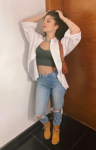 pose,kajal,jeans,white boots,ripped jeans,kajal aggarwal,high jeans,icon instagram,denims,white shirt,birce akalay,posing,jean jacket,photo shoot on the floor,leather boots,outfit,stylish,insta,jeans background,leather jacket