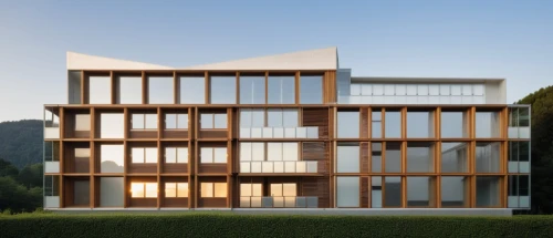 wooden facade,cubic house,archidaily,glass facade,modern architecture,modern house,frame house,timber house,facade panels,house hevelius,modern building,residential house,cube house,swiss house,kirrarchitecture,eco-construction,dunes house,lattice windows,contemporary,wooden house,Photography,General,Realistic