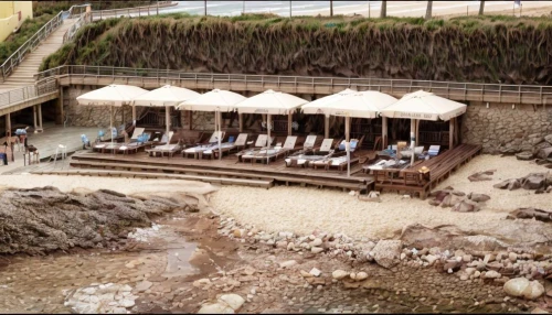 the hotel beach,beach restaurant,runswick bay,beach huts,tenby,chesil beach,dawlish warren,beach bar,kourion,thatch umbrellas,chalk cliff,east budleigh,dawlish,beach chairs,perranporth,beach hut,carbis bay,roman bath,clovelly,robin hood's bay