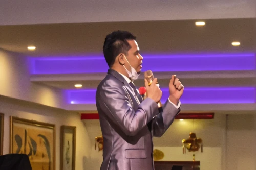 pastor,elvis impersonator,man praying,benediction of god the father,house of prayer,suit actor,wedding suit,concierge,divine healing energy,las vegas entertainer,worship,amnat charoen,church faith,3d rendering,nước chấm,mahendra singh dhoni,kaew chao chom,saf francisco,speech icon,business angel