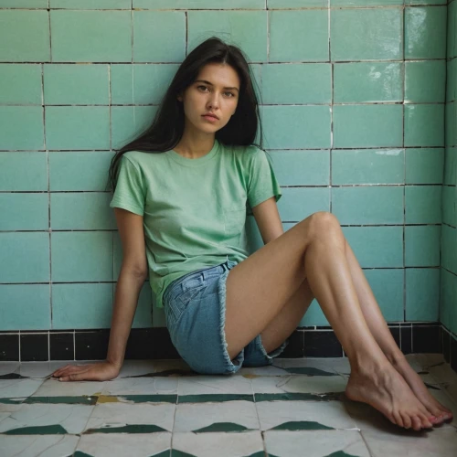 girl in t-shirt,in green,filipino,girl sitting,tshirt,turquoise,vietnamese,cotton top,tiles,dahlia white-green,barefoot,jade,light green,blue and green,green and blue,female model,green and white,legs crossed,color turquoise,sitting,Photography,Documentary Photography,Documentary Photography 20