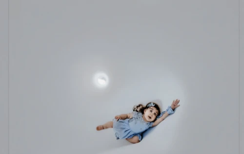 photographing children,flying girl,child's frame,ceiling light,on a transparent background,image manipulation,droste effect,heliosphere,on the ceiling,skylight,conceptual photography,girl on a white background,drawing with light,leap for joy,child playing,photo manipulation,poster mockup,on a white background,klaus rinke's time field,girl upside down,Photography,General,Realistic