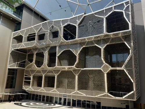building honeycomb,honeycomb structure,facade insulation,lattice windows,glass facade,reinforced concrete,outdoor structure,menger sponge,lattice window,iranian architecture,facade panels,insect house,cubic house,biotechnology research institute,athens art school,building structure,structural glass,wooden facade,nonbuilding structure,honeycomb stone