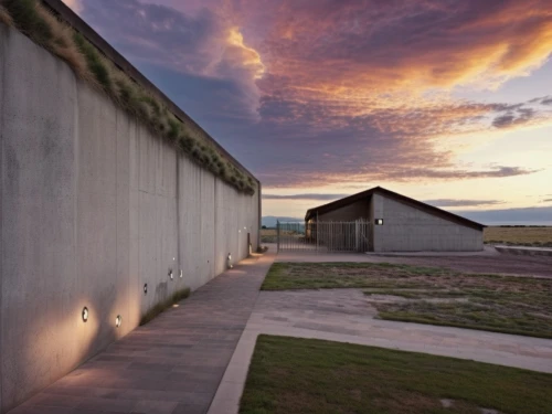 saltworks,dunes house,birkenau,historic fort smith court and jail,concrete wall,qasr azraq,exposed concrete,blockhouse,bunker,antelope island,la perouse,k13 submarine memorial park,concentration camp,prison fence,corten steel,australian cemetery,cement wall,wall,clay house,visitor center,Photography,General,Realistic