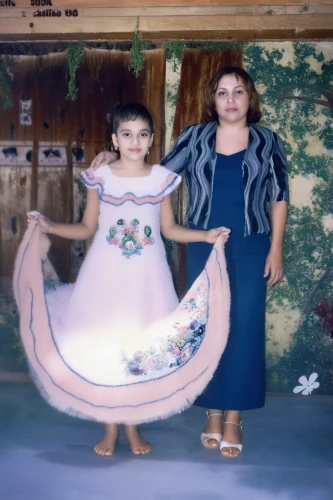 quinceañera,hoopskirt,crinoline,quinceanera dresses,little girl and mother,mexican tradition,vintage children,mother of the bride,girl in a long dress,little girl in pink dress,hispanic,mexican culture,grama,mexican,mom and daughter,first communion,ancient costume,miño,little girl fairy,a girl in a dress