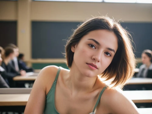 girl studying,girl sitting,worried girl,academic,the girl's face,language school,correspondence courses,online course,depressed woman,young woman,girl at the computer,student,woman sitting,stressed woman,adult education,girl in a long,college student,online courses,girl portrait,professor,Indoor,Classroom