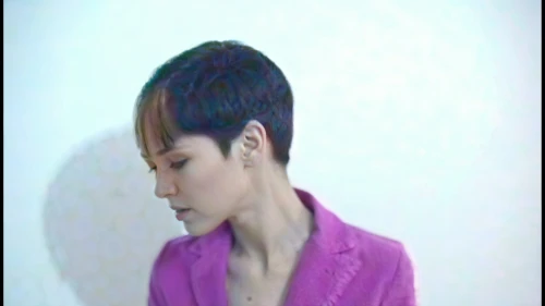 pink background,man in pink,purple background,pink-purple,clove pink,a wax dummy,boy model,mohawk hairstyle,neck,blouse,dusky pink,pink large,pink ribbon,male model,color background,web cam,video scene,tan chen chen,prince,video clip