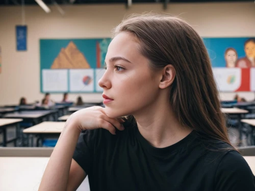 girl studying,girl portrait,portrait of a girl,girl in t-shirt,semi-profile,girl in a long,young woman,girl sitting,art model,female model,girl with speech bubble,profile,girl at the computer,worried girl,teen,the girl's face,half profile,portrait background,academic,beautiful young woman,Indoor,Classroom