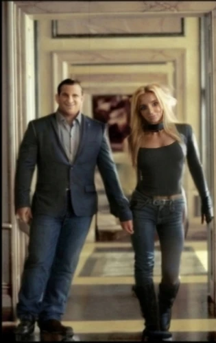 bodyguard,mobster couple,video scene,hold hands,revolving door,golden ritriver and vorderman dark,hand in hand,ballroom dance,pretty woman,holding hands,man and woman,handcuffed,hands holding,dancing couple,husband and wife,two people,man and wife,ballroom,couple goal,blue jeans