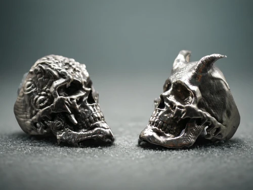 skulls,grave jewelry,cufflinks,skulls bones,silver octopus,skulls and,metal implants,silver pieces,skull and crossbones,cufflink,skull sculpture,molten metal,ring jewelry,ring with ornament,fossilized resin,metalsmith,jewelry manufacturing,wedding rings,skull and cross bones,fossils