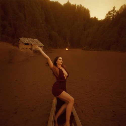 girl on the dune,red sand,paddler,levitation,siren,photoshoot with water,playing in the sand,croft,conceptual photography,levitating,wading,paddle board,floating on the river,paddling,girl on the river,digital compositing,dita von teese,sand timer,paddleboard,sepia,Photography,Artistic Photography,Artistic Photography 14