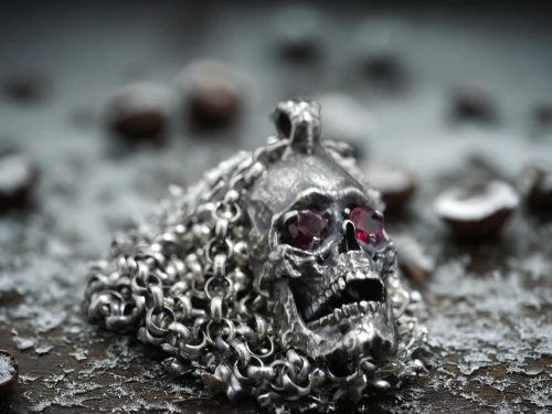grave jewelry,metal pile,diamond pendant,body jewelry,silversmith,gift of jewelry,skull sculpture,silver octopus,silver pieces,metalsmith,greyskull,jewlry,house jewelry,metal figure,metal implants,saw chain,trinkets,chain mail,skull with crown,iron chain