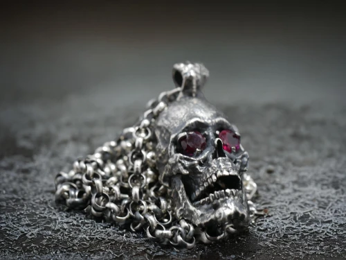 grave jewelry,skull sculpture,skull and cross bones,house jewelry,silver octopus,gift of jewelry,body jewelry,day of the dead skeleton,diamond pendant,skull with crown,vanitas,metal pile,calavera,skull and crossbones,saw chain,memento mori,skulls and,jewlry,skeleton key,ring jewelry