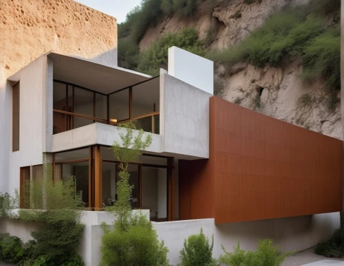corten steel,dunes house,stucco wall,modern house,cubic house,cliff dwelling,modern architecture,residential house,exterior decoration,cube house,exposed concrete,house in mountains,house wall,house in the mountains,private house,stucco,archidaily,frame house,glass facade,eco-construction,Photography,General,Realistic