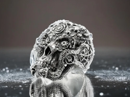 ring with ornament,silver octopus,skull sculpture,briquet griffon vendéen,ring jewelry,calaverita sugar,wedding ring,animal skull,crystal egg,silversmith,a pistol shaped gland,skull statue,hamsa,frozen poop,diamond pendant,silver pieces,snow owl,silver,pre-engagement ring,grave jewelry