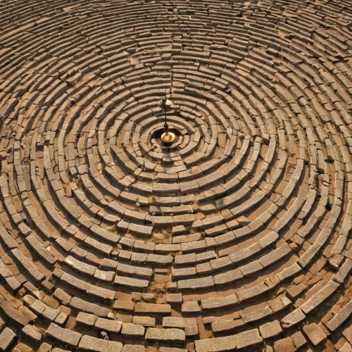yantra,lalibela,concentric,labyrinth,wooden wheel,manhole,axum,spiral pattern,manhole cover,brick-kiln,chambered cairn,qutubminar,paving stones,flagstone,stone floor,chair circle,floor fountain,taraxum,paving stone,greek in a circle,Photography,General,Realistic